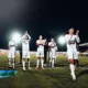 alt= les joueurs de la Renaissance Berkane célébrant leur victoire contre le Difaa El Jadida.