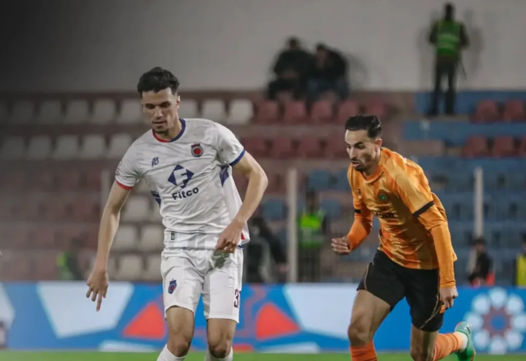 Alt= Phase de jeu de la rencontre OCS-RS Berkane comptant pour la 10e journée.