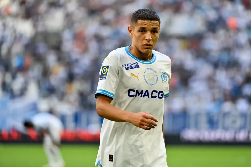 ALT= OM PSG Amine Harit.